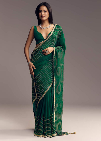 bottle-green-organza-saree-with-scalloped-cut-dana-detailing-sg317717-1