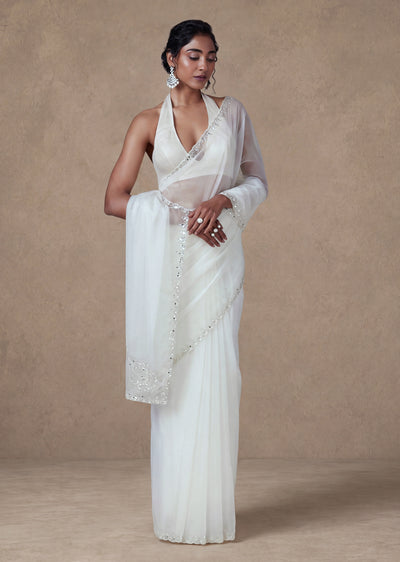 Cream Organza Saree With Embellished Border And Unstitched Blouse