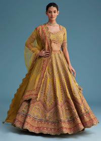 Mustard Crepe Lehenga Set With Floral Motif And Embroidery