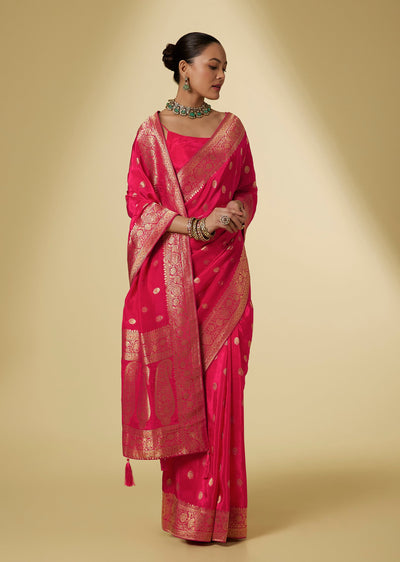 Rani Pink Silk Zari Woven Saree With Floral Motifs