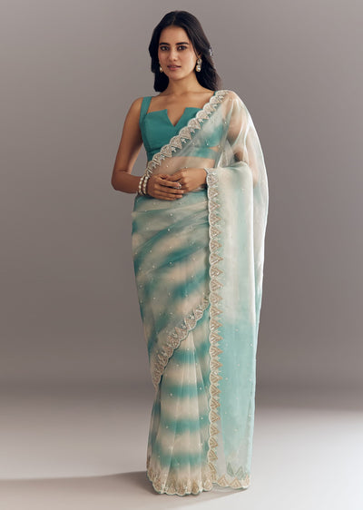 teal-blue-shaded-organza-saree-with-moti-stone-sequins-embroidery-and-cutwork-scallop-border-sg292893-1