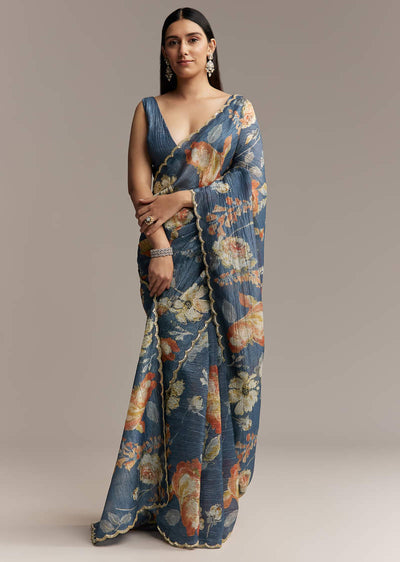 teal-blue-tissue-saree-with-floral-print-and-embroidered-border-sg319438-1