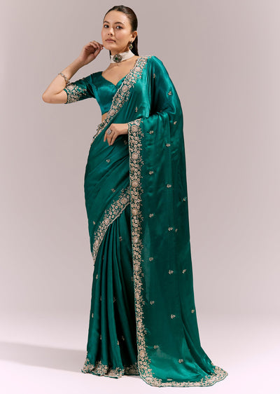 turquoise-blue-satin-chinon-saree-with-cutwork-floral-embroidered-border-sg385072-1 e841d6d6-da47-4c64-ab91-c2f0e53a0dfd