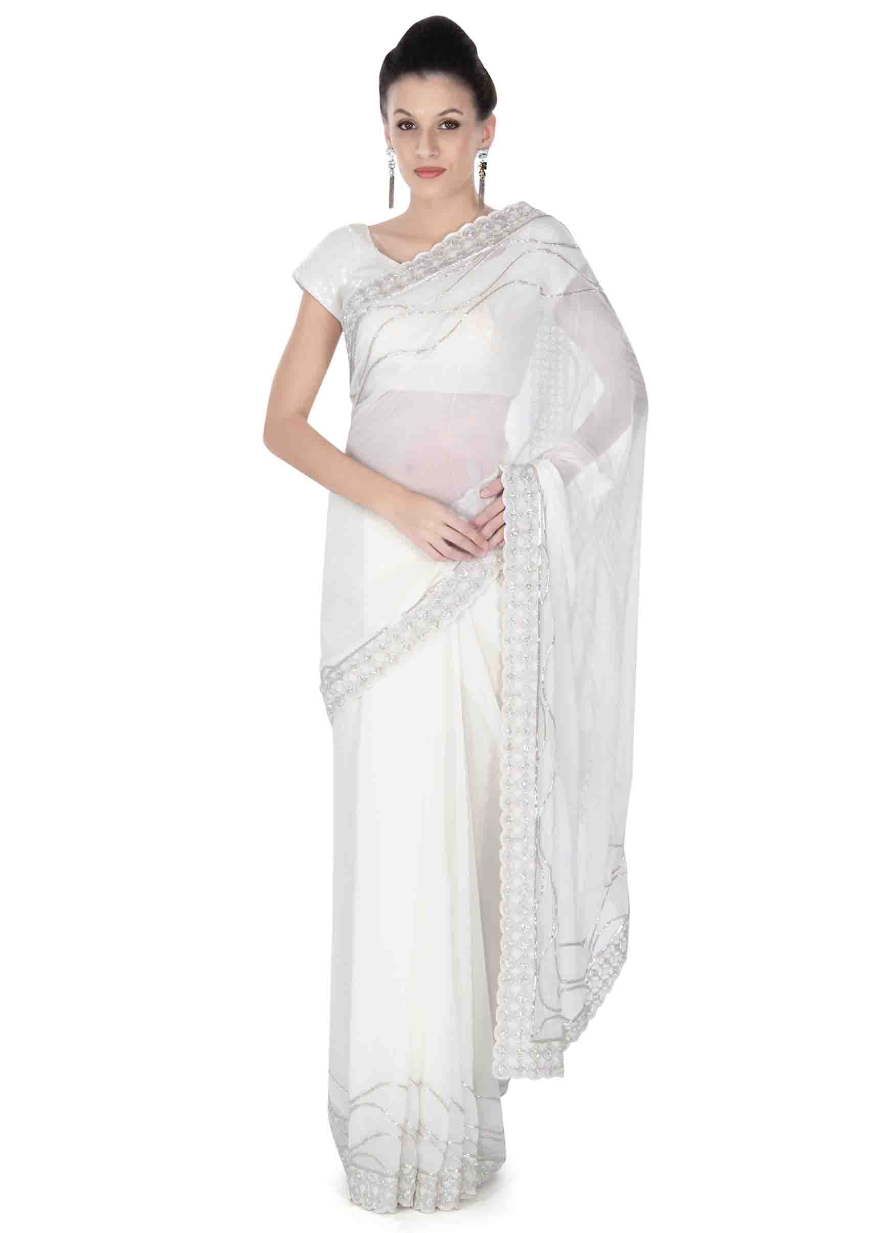 White saree in embroidered butti and border only on Kalki - KALKI Fashion India