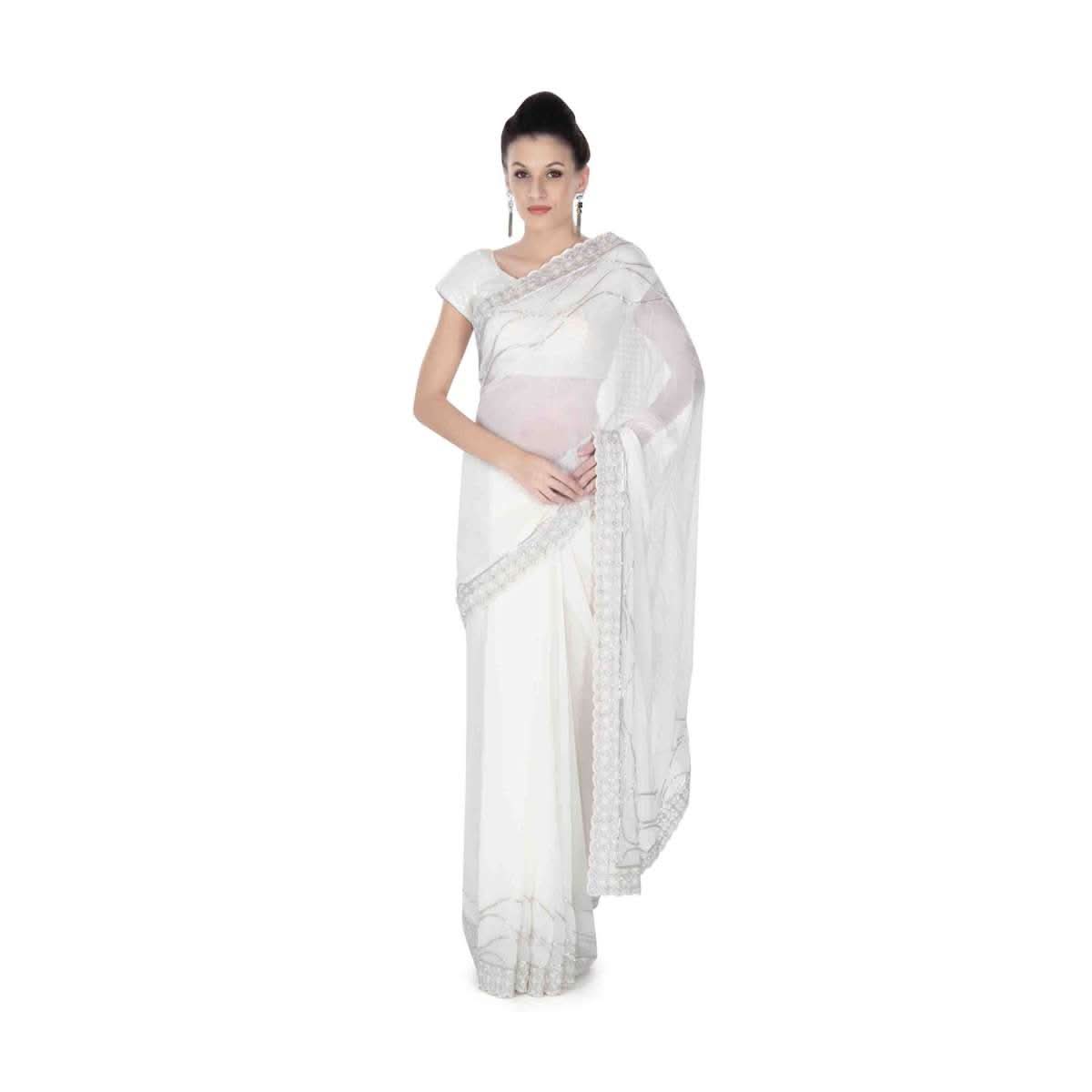 White saree in embroidered butti and border only on Kalki - KALKI Fashion India