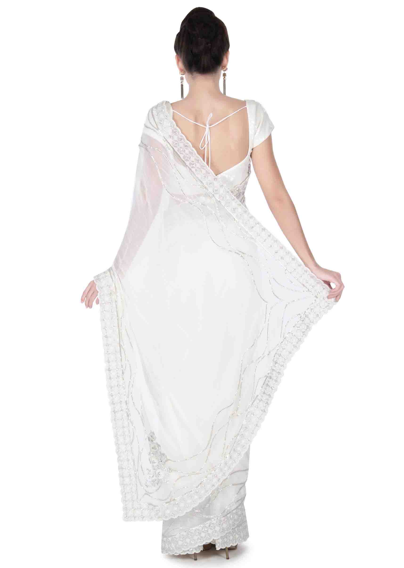 White saree in embroidered butti and border only on Kalki - KALKI Fashion India
