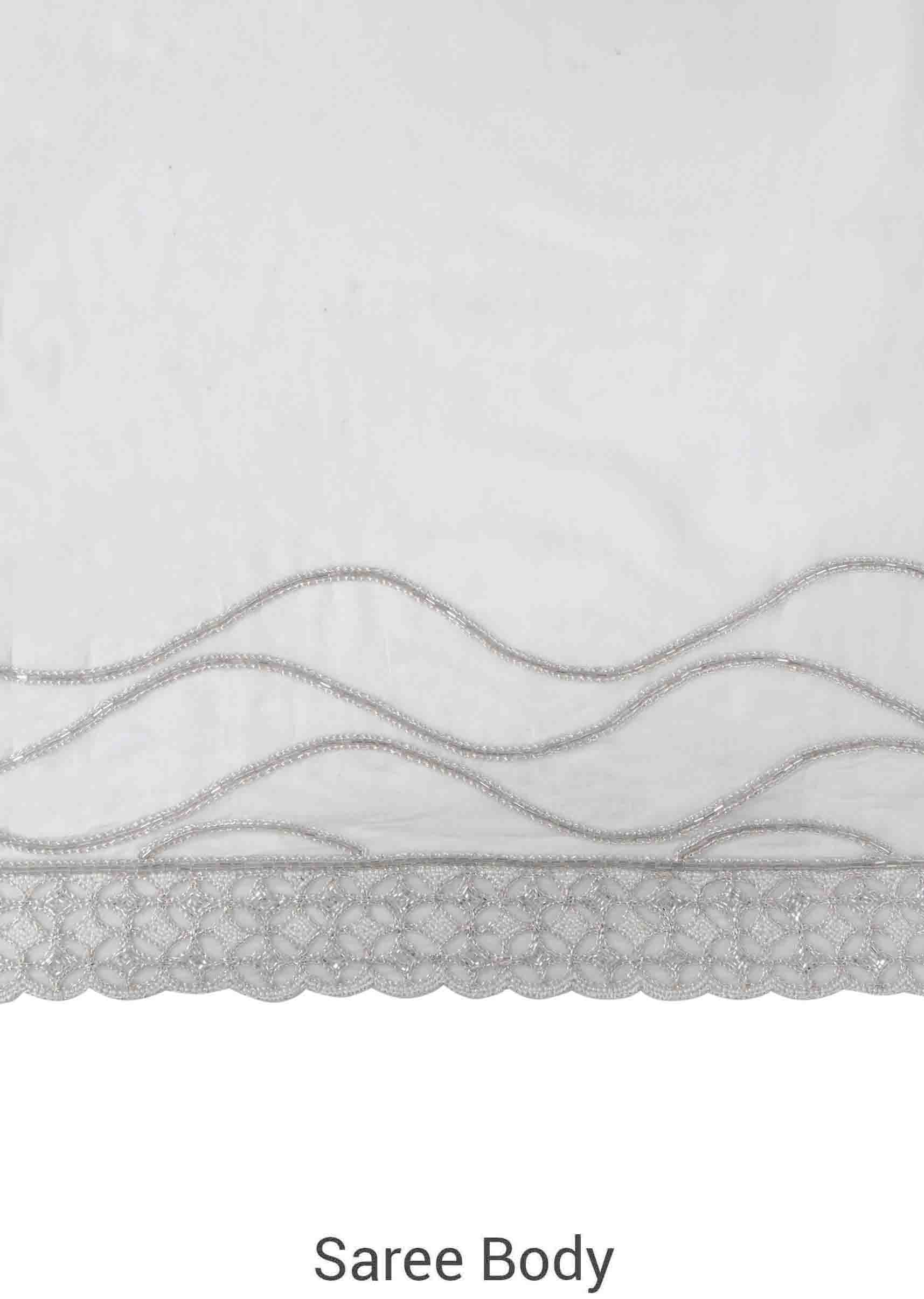 White saree in embroidered butti and border only on Kalki - KALKI Fashion India