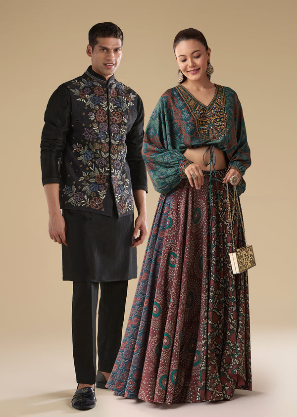 Indigo Noir Festive Couple Set – Indigo Printed Crop Top & Skirt Set for Her And Black Embroidered Silk Kurta Jacket Set for Him