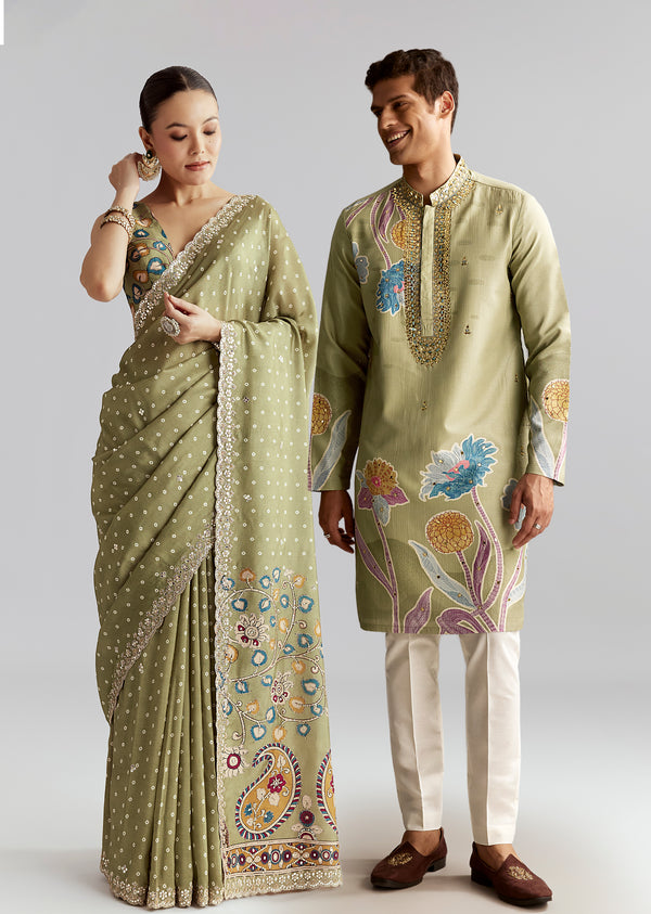 Pastel Day Couple Set – Pista Green Hand-Embroidered Muslin Saree for Her And Pastel Green Mirror Work Kurta Set for Him