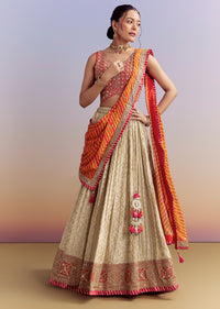 Orange Brocade Silk Bridesmaid Lehenga With Leheriya Dupatta