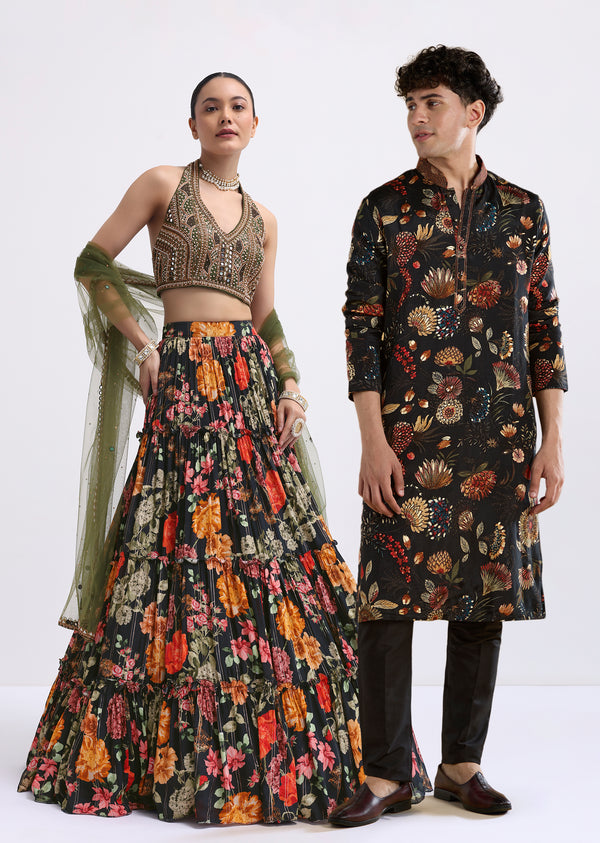 Timeless Floral Couple Set – Black Floral Printed Silk Lehenga Choli For Her And Black Silk Kurta Set With Resham Embroidery For Him