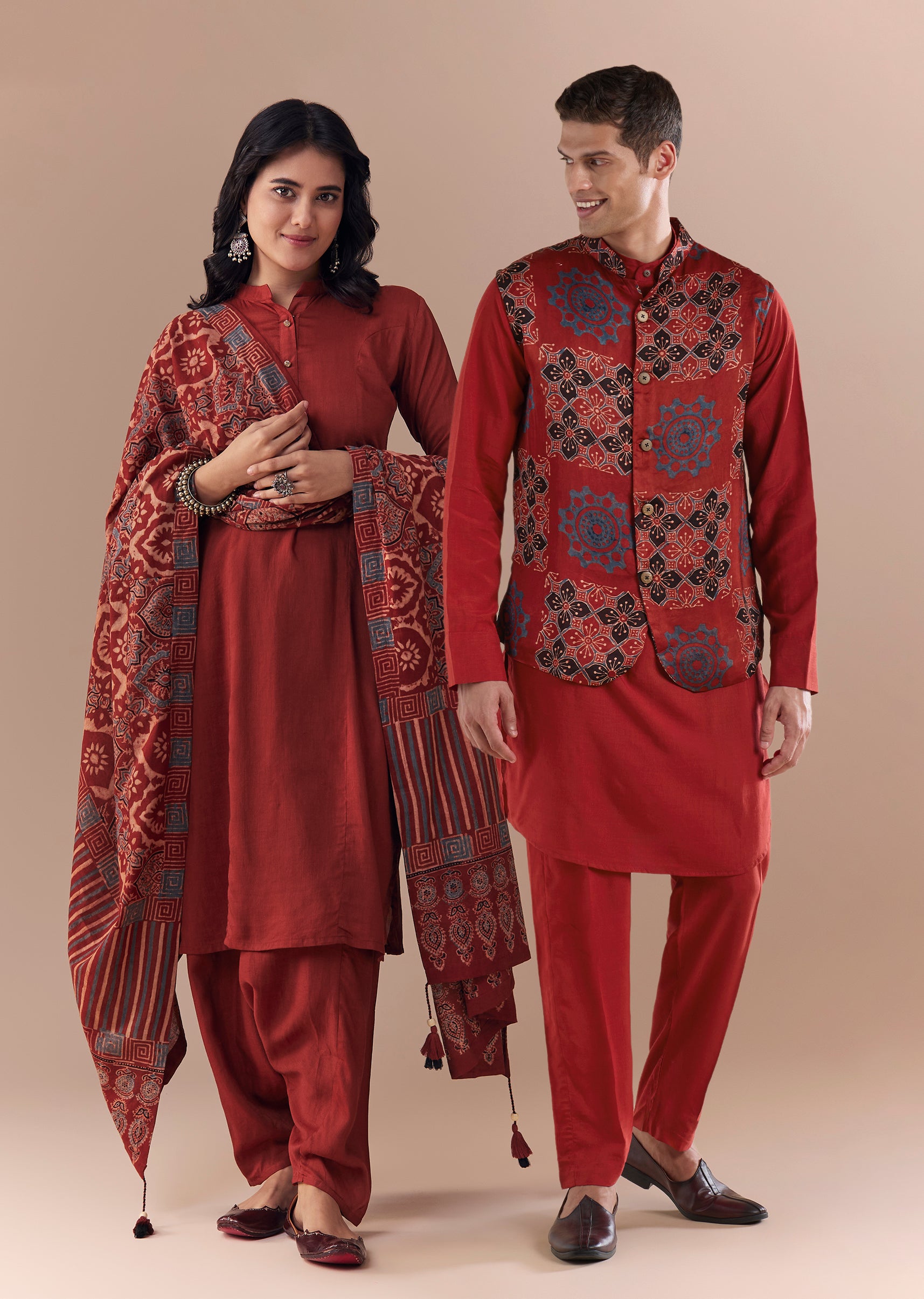 Heritage Ajrakh Couple Set – Maroon Linen Kurta Set With Ajrakh Dupatta For Her And Red Ajrakh Kurta Jacket Set For Him