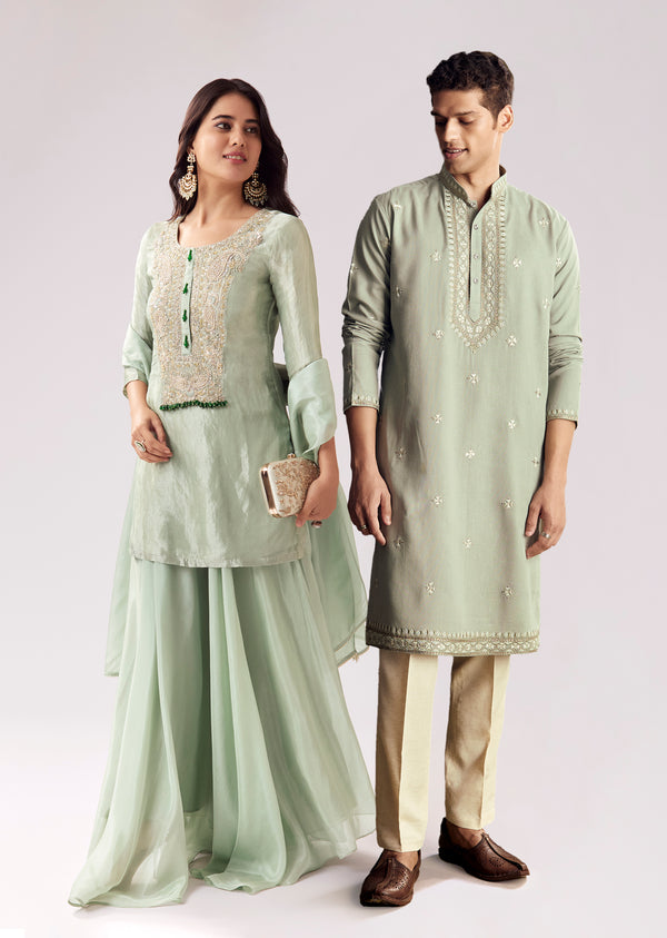 Emerald Green Celebration Pair – Zardozi Palazzo Suit For Her And Pastel Green Embroidered Linen Kurta Set For Him