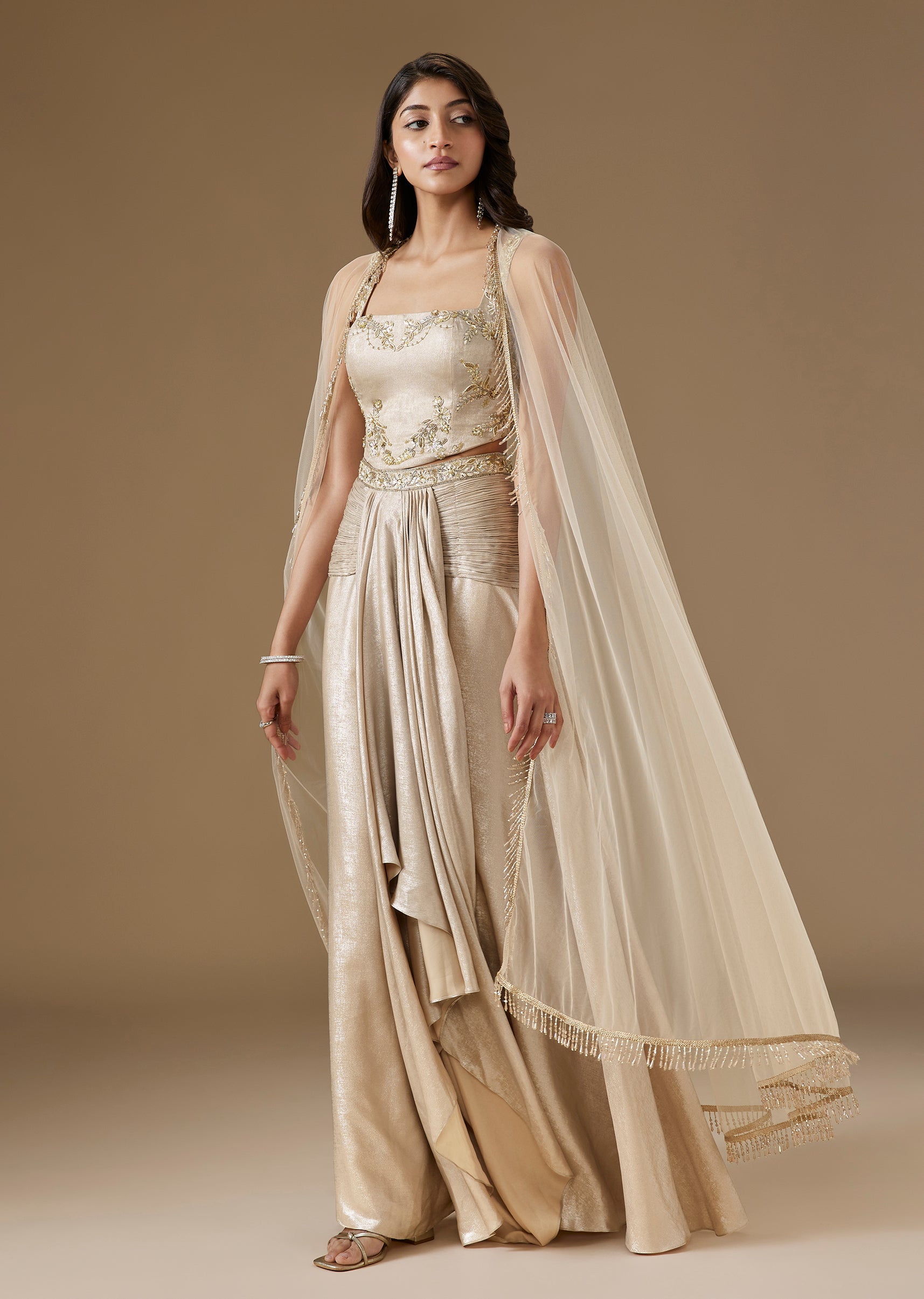 Beige Corset Crop Top And Skirt Set With Net Cape