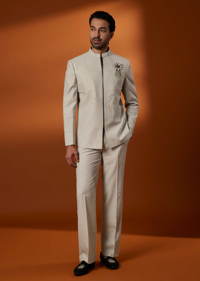 Beige Rayon Jodhpuri Set With Embellished Brooch