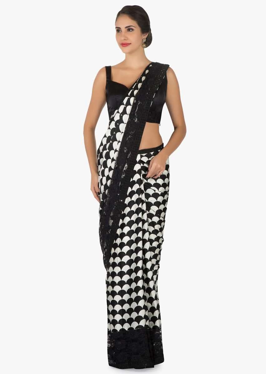 Black and white satin silk saree with unstitched blouse