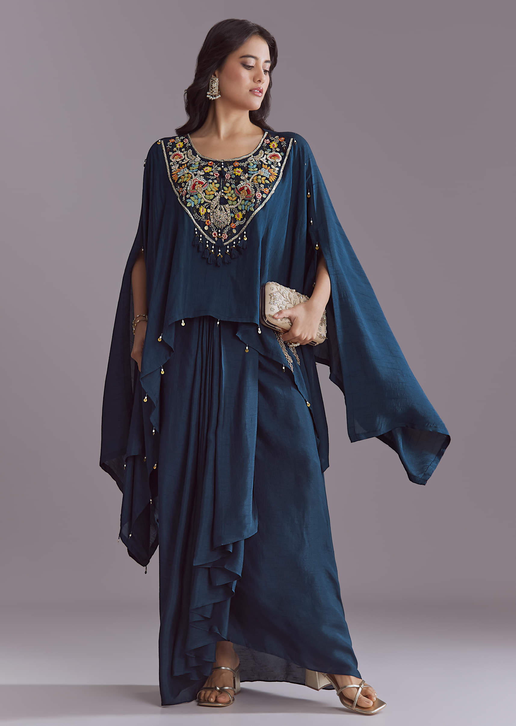 https://in.kalkifashion.com/cdn/shop/files/blue-silk-kaftan-top-and-drape-skirt-set-with-embroidery-sg345610-1.jpg?v=1758093924