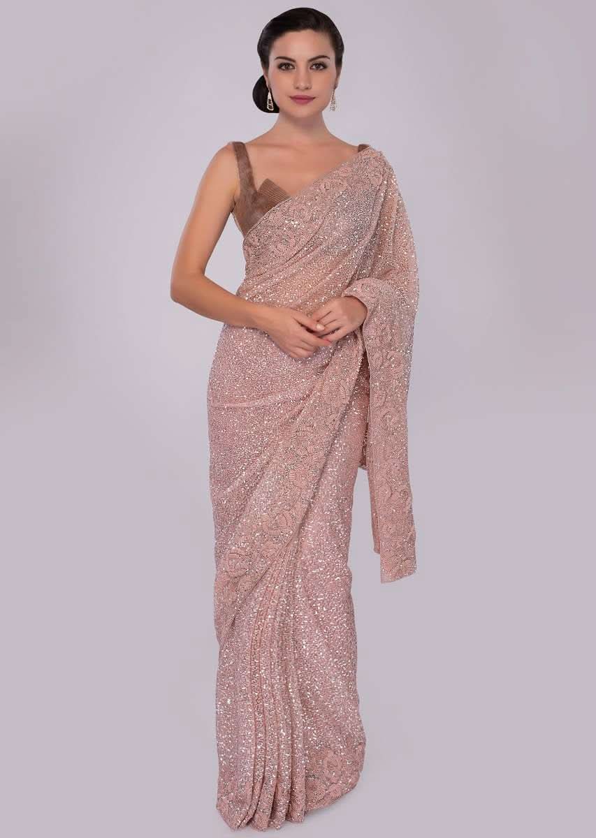 Blush pink hand sequins embroidered saree with spring work border 