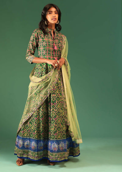bottle green anarkali suit in raw silk with patola print and kundan detailing along with a yellow net dupatta online - kalki fashion 5 3