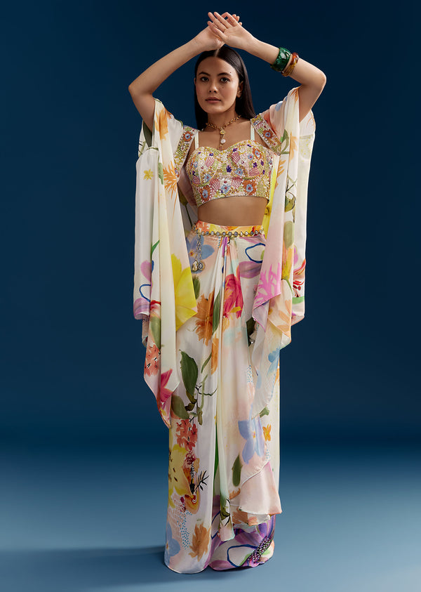 Cream Crop Top Skirt Set With Embroidered Cape And Floral Print