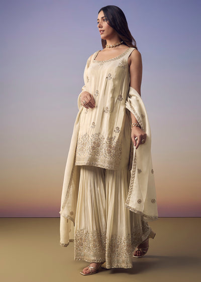 cream-embroidered-kurta-sharara-set-sg327767-1 ad14aa40-4bc3-4a40-bc7c-7a44cf24cf0a