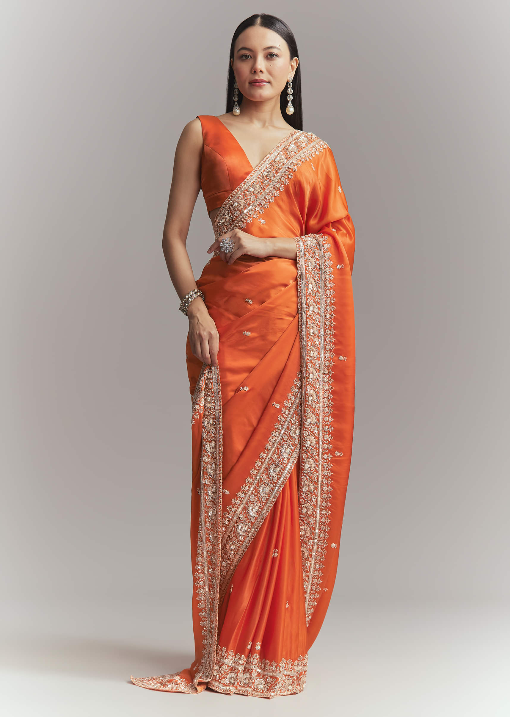 Dusky Orange Satin Embroidered Saree With Heavy Hand Embroidery