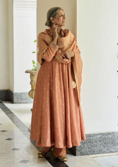 Dusty peach embroidered anarkali paired with pant and dupatta.