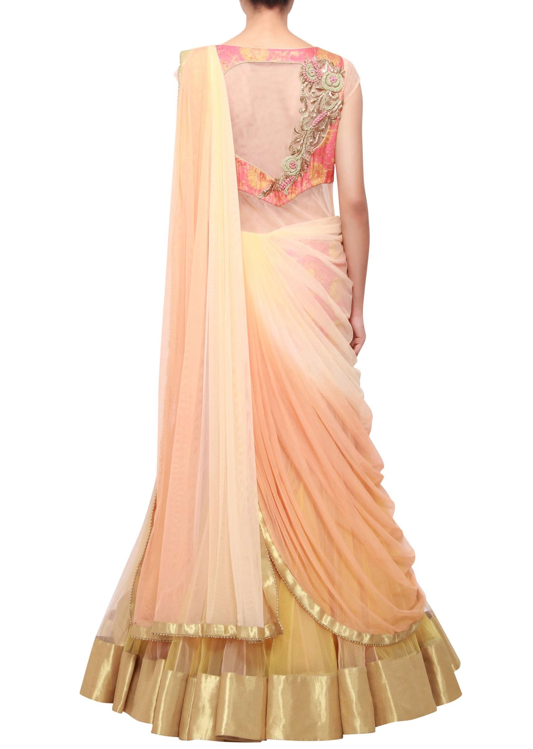 Peachy cream shaded lehenga sari embellished in zardosi only on Kalki - KALKI Fashion India