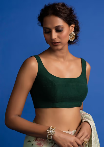 forest green sleeveless blouse.png