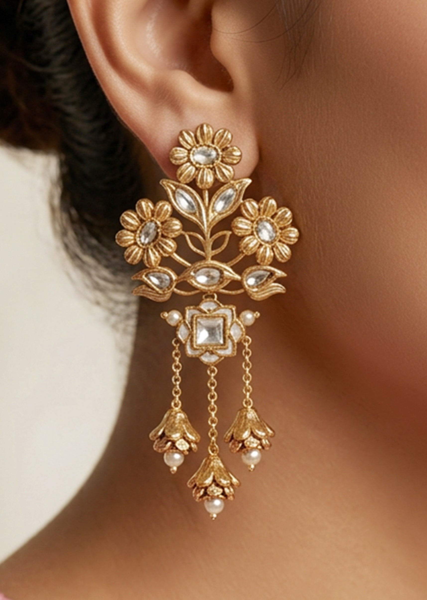 Gold Toned Floral Earrings With Kundan Stones And Jhumka Drops