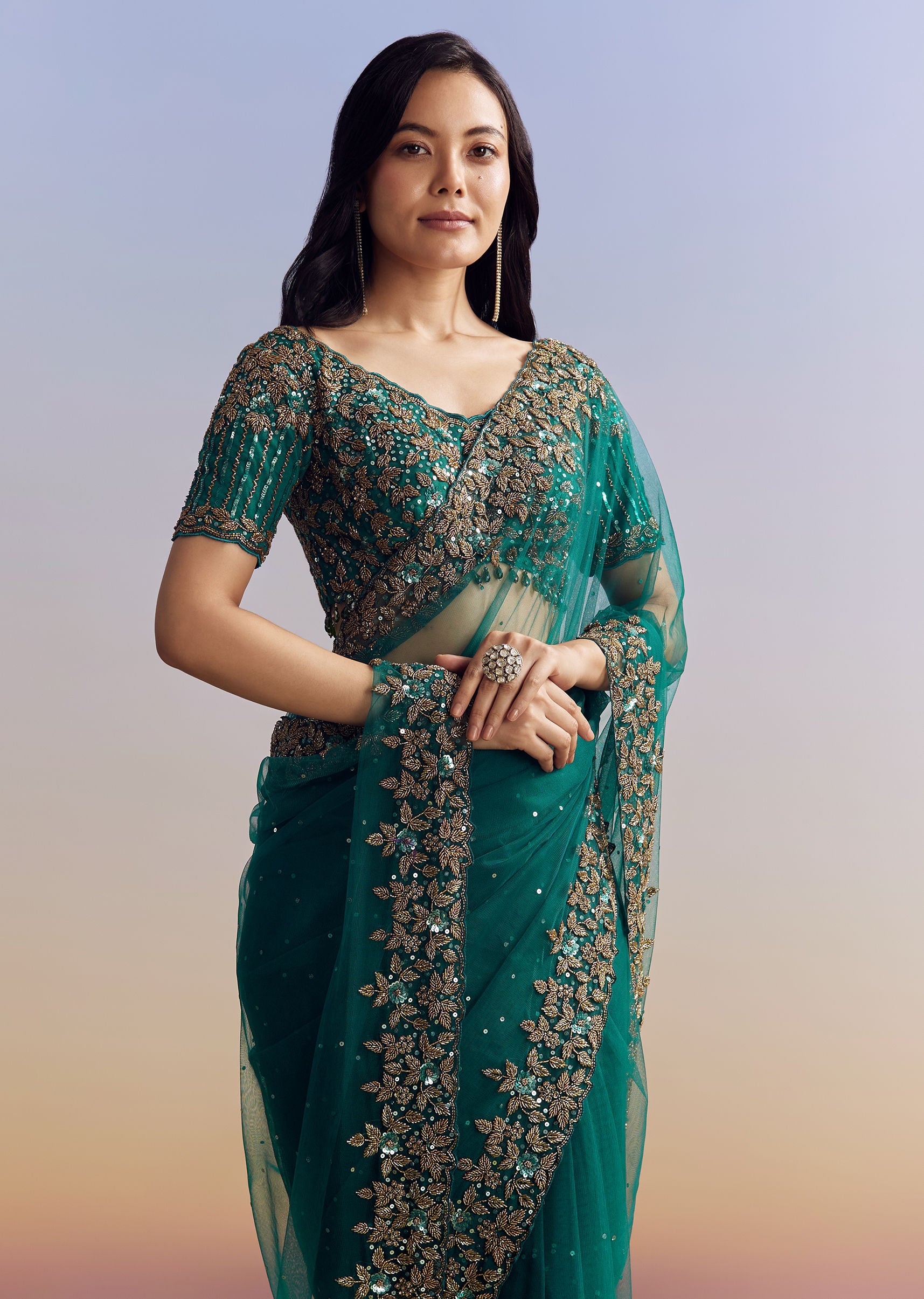 Green Net Saree Featuring Heavy Embroidered Border
