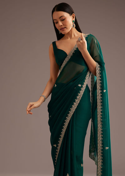 green-organza-saree-with-cutdana-and-sequins-border-sg285290-1