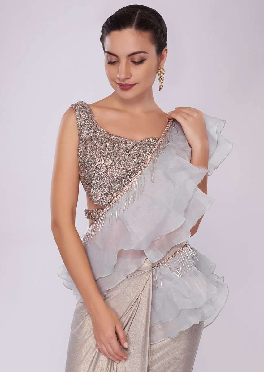 Grey lycra saree with draped pleats and ruffled organza pallo 