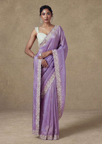 Lavender Tissue Saree With Embellished Jaal Border And Unstitched Blouse