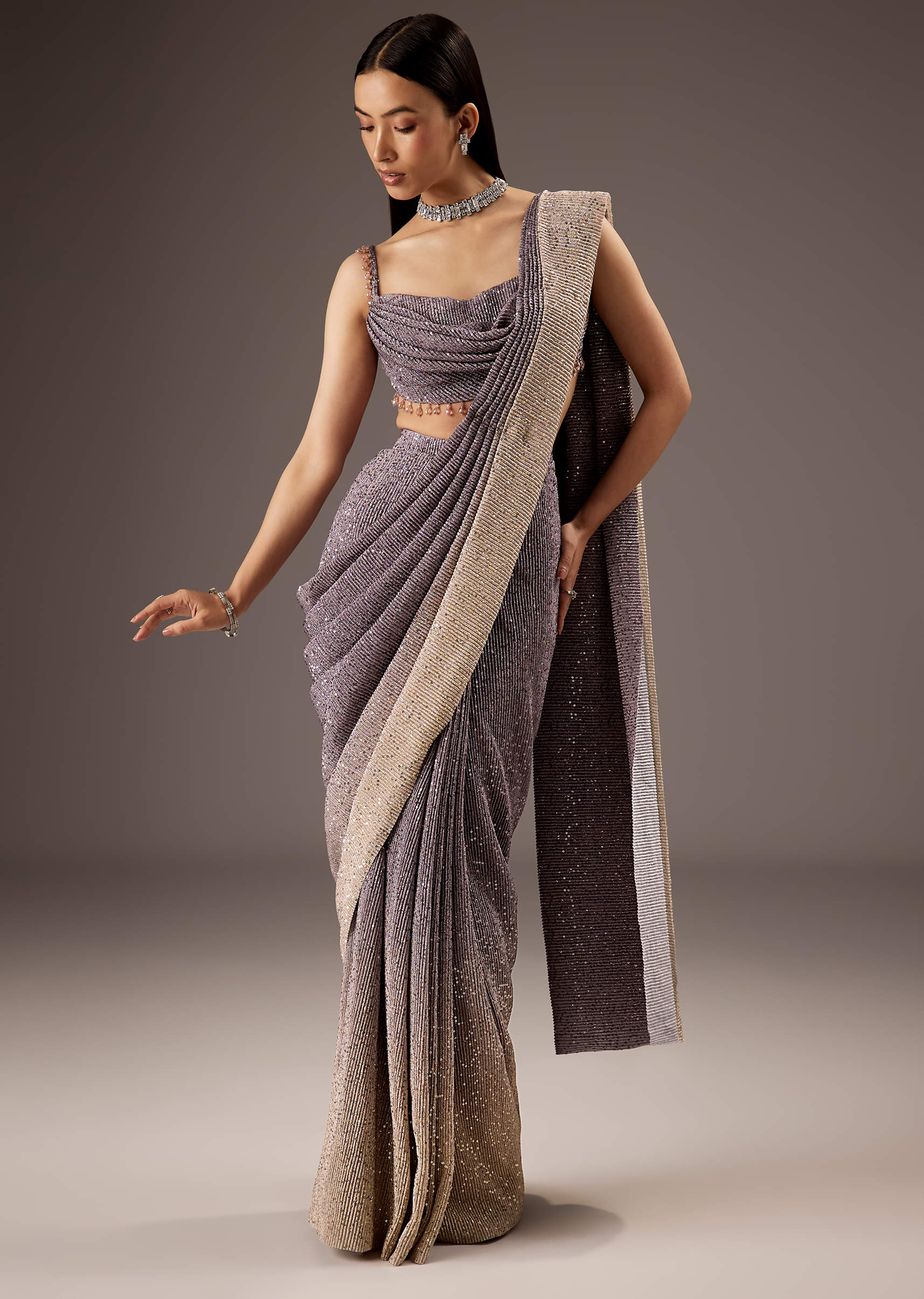 Lilac Purple Saree With Layered Blouse And Elegant Tassels