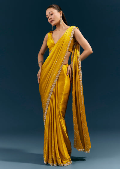mustard-yellow-satin-chinon-saree-with-hand-embroidered-border-all-over-sequin-sparkle-sg385076-1 44e74927-7cbc-4d09-baae-a819fbfaf05e