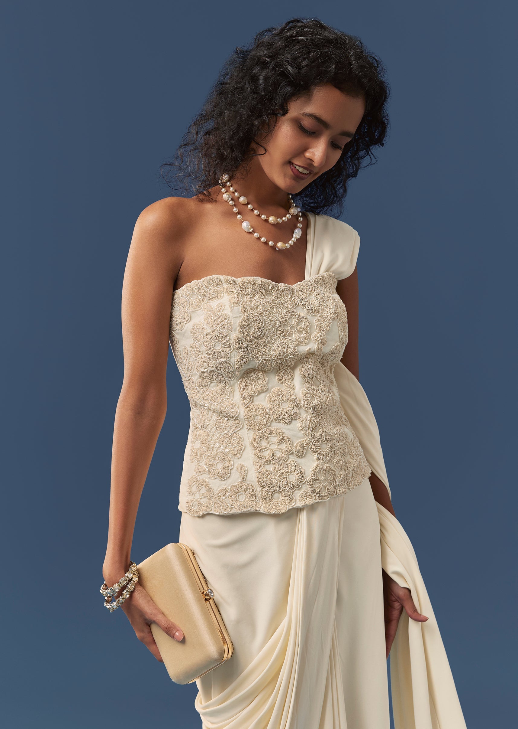 off-white-pre-draped-saree-with-corset-blouse-sg378390-4 bbd4f5fd-d170-42e4-8666-301d0de9c8cb