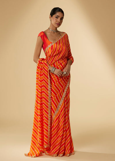 Orange Crepe Leheriya Digital Printed Saree With Abla Embellished Border Pallu