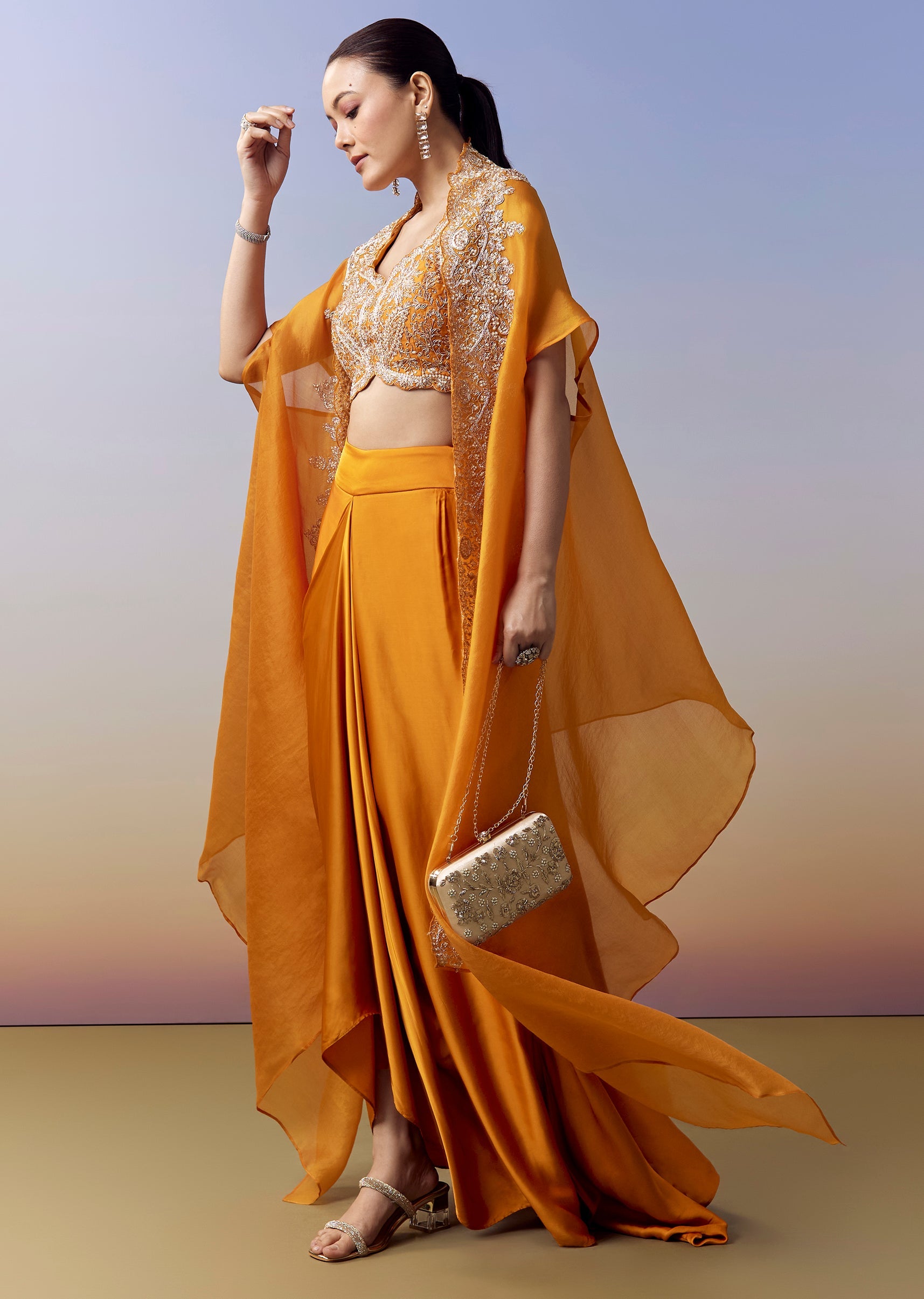 Orange Indo Western Crop Top Skirt Set With Zardosi Work And Organza Cape