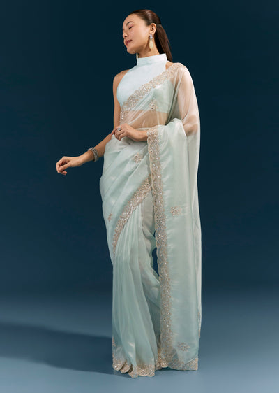 powder-blue-net-saree-with-scalloped-embroidered-border-and-shimmer-detailing-sg385098-1 61f53a9b-ed93-4ecb-ac3b-edca1f57fc90