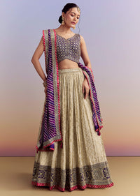 Purple Brocade Silk Bridesmaid Lehenga With Leheriya Dupatta And Zardosi Work