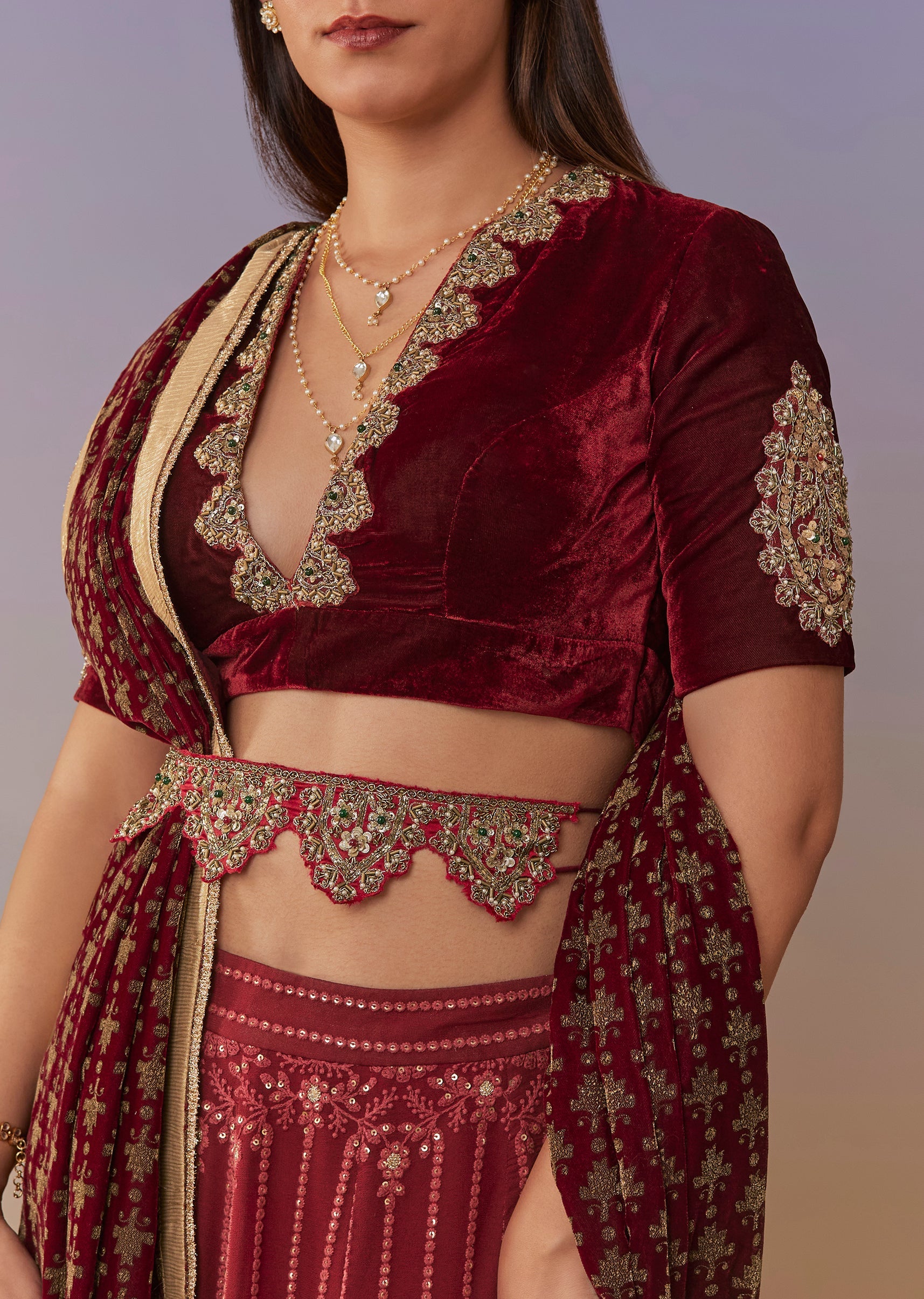 red-embroidered-lehenga-set-with-velvet-blouse-and-statement-belt-sg392228-3 18e4db33-0aec-4b92-aff3-df2c49fb43a5