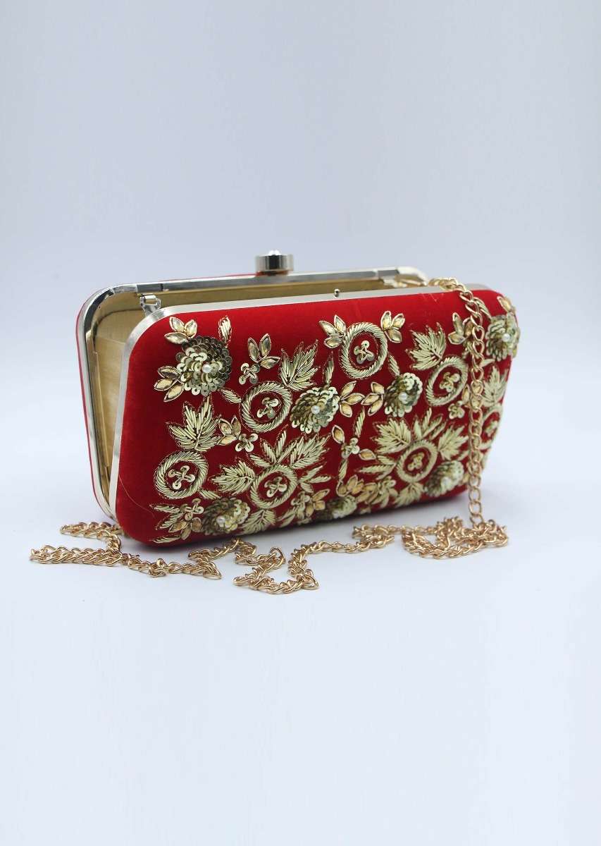 Red sling clutch bag embellished in zardosi floral embroidery 