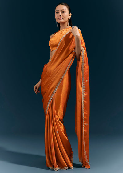 rust-orange-satin-chinon-saree-with-scalloped-border-and-hand-embroidered-buttis-sg385083-1 8e8bc300-f1b1-4e48-8c25-1f15e1f04d99