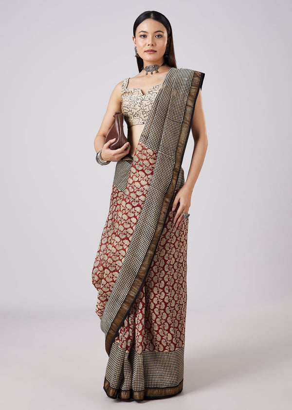 Rust Saree with Hand Painted Motifs and Stitched Blouse
