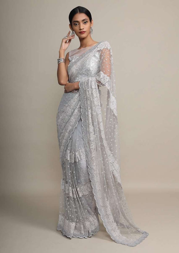 Silver Grey Saree In Net Embellished With Kundan In A Fancy Striped Design Online - Kalki Fashion