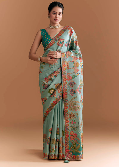 sky-blue-dola-silk-saree-with-madhubani-weave-and-embroidery-sg349809-1