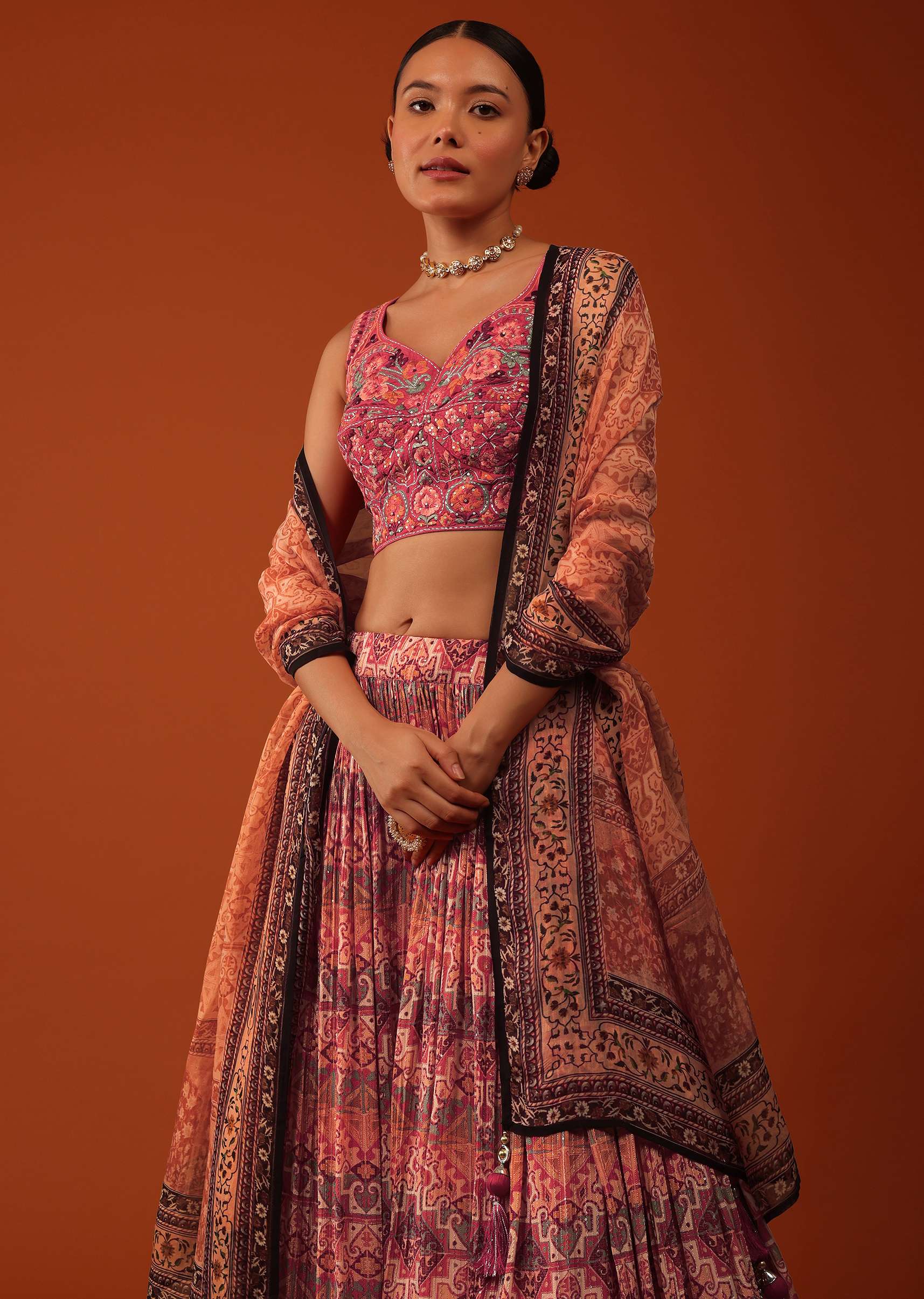 Tangerine Orange Ajrakh Printed Lehenga And Blouse Set In Chinon