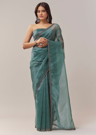 teal-blue-net-saree-with-zigzag-cutwork-border-and-sequin-embroidery-sg337603-1 dae7b02e-8dd2-43c4-8813-5f3700124c87