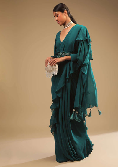 teal blue saree in georgette with ruffle frill bishop sleeves crop top and a chunky embroidered belt online - kalki fashion 45 1